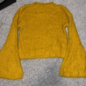 Super soft feathery yellow shirt with flared sleeves